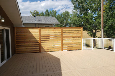 Inspiration for a contemporary deck remodel in Calgary
