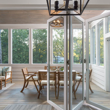 Folding Glass Doors Opening the Dining Room to the Sun Porch