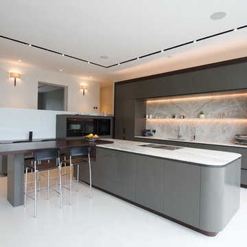 Kitchen in polished Corian, Taj Mahal Granite and Wenge