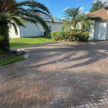 Coastal Herringbone & Travertine Paver Driveway | Treasure Coast Florida