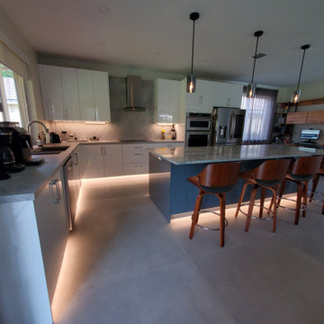 Stunning Kitchen Remodel Done in White and Gray Cabinets