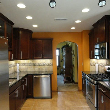 Kitchen ft. Staggered Cabient & Stone Backsplash