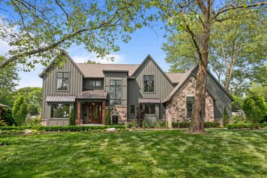Large cottage two-story exterior home photo in Detroit
