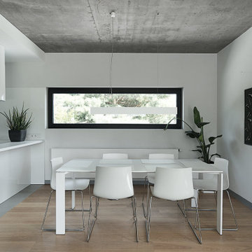 Dining room in a loft style house interior in Rokietnica