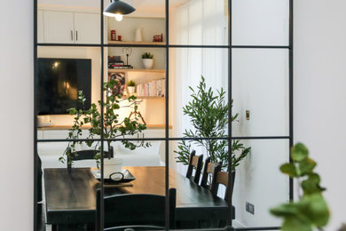 Dining room - cottage dining room idea in Other
