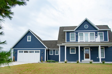 Inspiration for a transitional exterior home remodel in Other