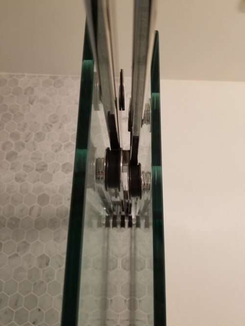 Help! Large gap between my two sliding glass frameless shower doors