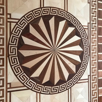 Decorative border frames the flooring much like a picture frame