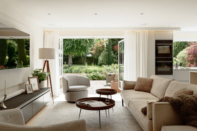 Inspiration for a medium sized contemporary cream and black living room in Other with limestone flooring and beige floors.