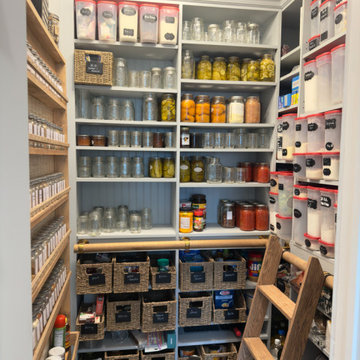 Apothecary-Style Pantry with Built-In Ladder and Vintage Details