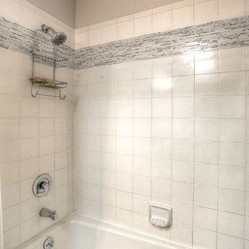 Remodeled Bathroom with Shower and Bathtub Combination