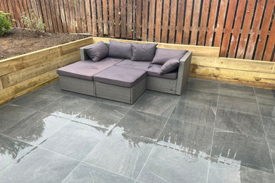 Patio - small contemporary backyard patio idea in London
