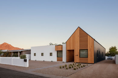 Example of a trendy brown one-story mixed siding house exterior design in Phoenix