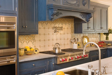 Large elegant l-shaped kitchen photo in New York with beaded inset cabinets and gray countertops