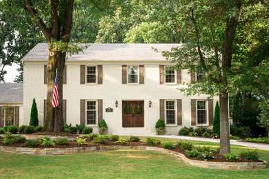Example of a transitional exterior home design in Little Rock