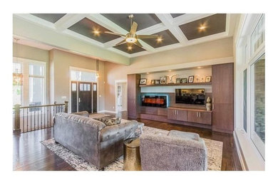 Family room - modern family room idea in Cedar Rapids