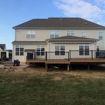 Timbertech legacy deck with aluminum rails with lighted post caps.