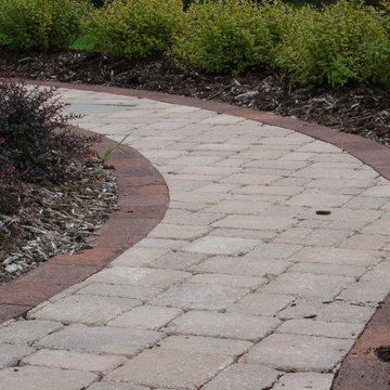 Formal paver patio gardens