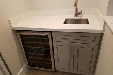 Inspiration for a home bar remodel in Austin