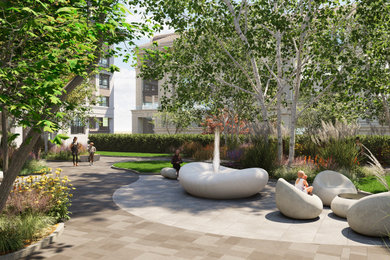 Ispirazione per un ampio giardino minimalista esposto a mezz'ombra davanti casa in primavera con pavimentazioni in pietra naturale