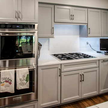 Custom Two Tone Gray Kosher Kitchen with Quartz Countertops