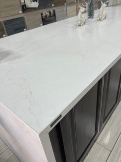 Help! Struggling to find countertops for cream cabinets.