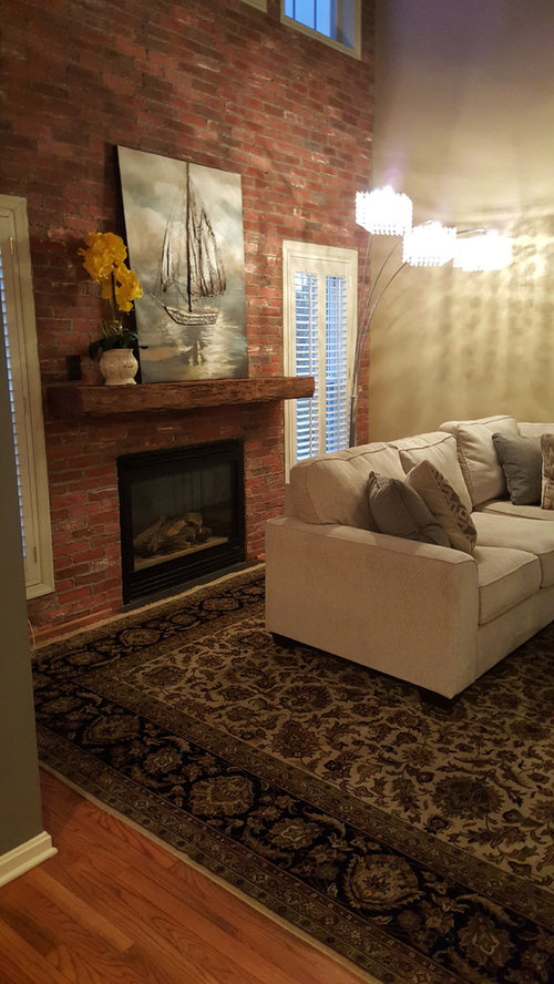 Sofa backs to fireplace