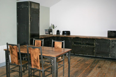 This is an example of a rustic kitchen in Other.