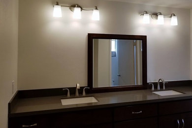 Example of a mid-sized trendy master bathroom design in Orange County with flat-panel cabinets