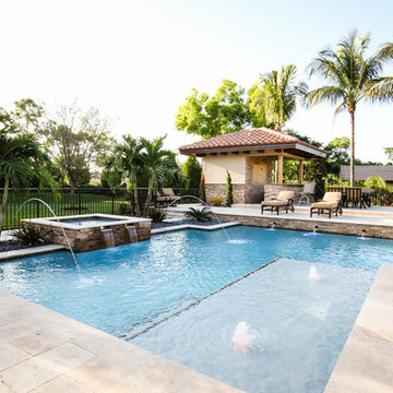Roman/Geometric Pool with Spa & Water Features Including Sun Shelf in Boynton Be