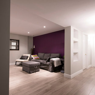 Inspiration for a medium sized modern basement in Other with purple walls, no fireplace and beige floors.