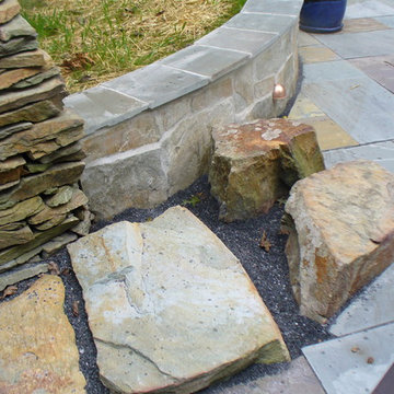 Rocks in front of Fire Pit enhances placed to enhance rustic feel