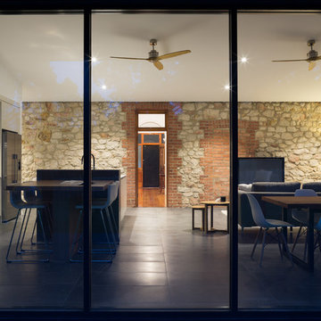 TRADITIONAL STONE VILLA TURNS OPEN CONTEMPORARY