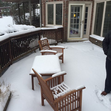 Outdoor Kitchen with  fireplace, dining area and seating wall