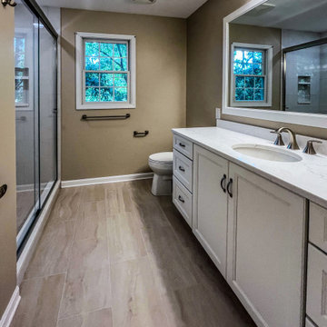 Timeless White Vanity Paired with Luxury Tiled Shower