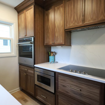 Rich & Refined: Custom Walnut Kitchen Remodel with White Quartz & Oak Flooring