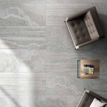 Contemporary living room with grey stone look porcelain tile