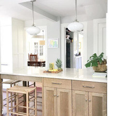 Kraftmaid white oak cabinets with warm white
