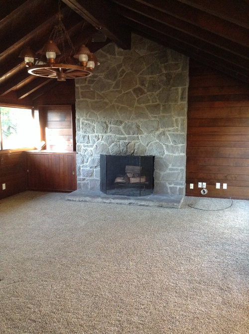 What kinda flooring goes with a wood panel Living Room?