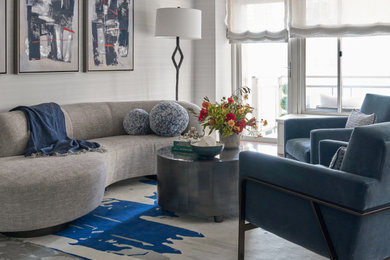 Living room - mid-sized transitional formal blue floor and wallpaper living room idea in New York with beige walls