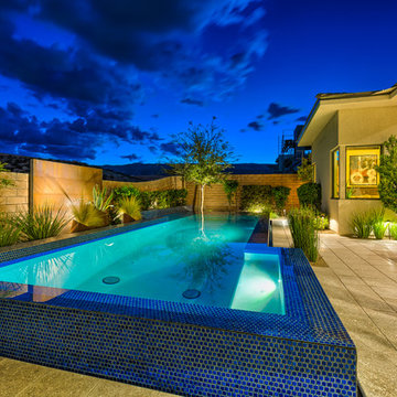 Raised Rim Flow Pool with Custom Fire/Water Feature