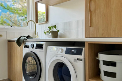 Design ideas for a contemporary laundry room in Melbourne.