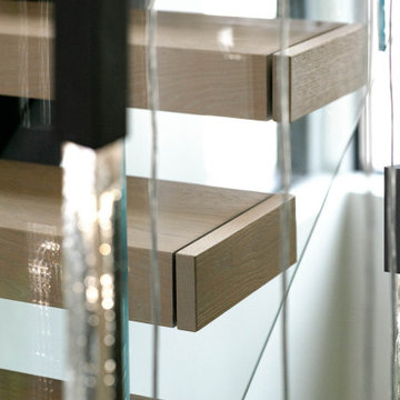 Electic Switchback Staircase with Glass Railing
