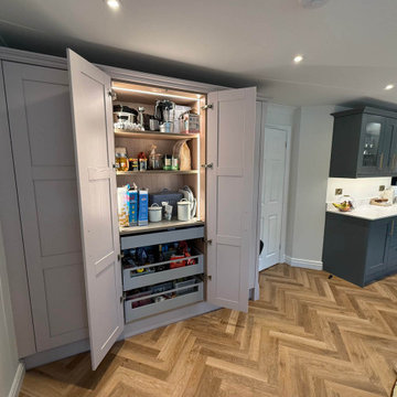 Green & Light Pink Shaker Kitchen in Thrapston
