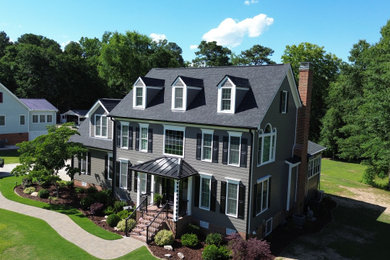 Example of a minimalist exterior home design in Raleigh