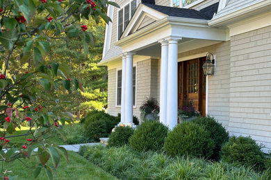 Example of a transitional home design design in Boston