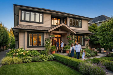 Example of a mid-sized classic beige two-story concrete fiberboard and clapboard house exterior design in Vancouver with a hip roof, a shingle roof and a black roof