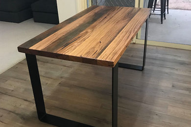 Inspiration for an industrial dining room in Other.