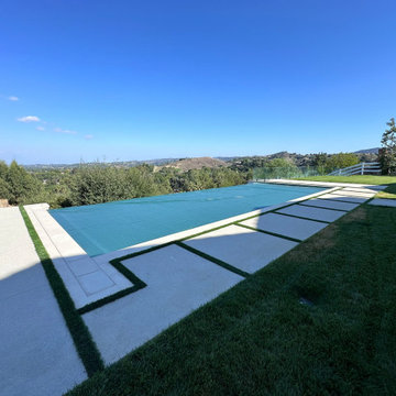 Jim Bredger Infinity edge pool and spa with atomatic cover