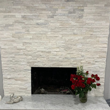 Stacked stone fireplace surround